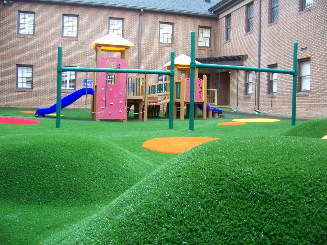 Hilly artificial turf playground by Southwest Greens of New Mexico